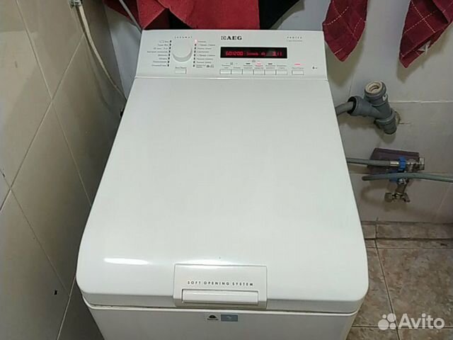 AEG с вертикальной загрузкой 6 кг 1200 об