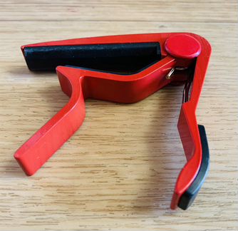 Каподастр для гитары