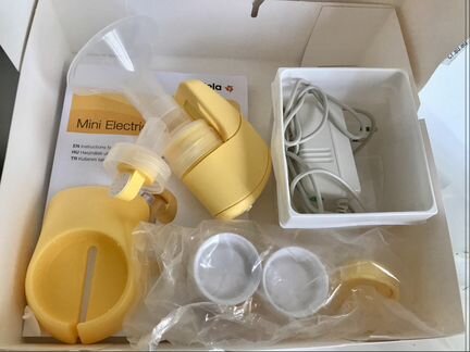 Молокоотсос Medela электрический + бутылочки