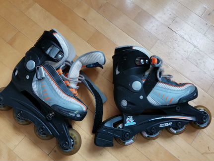 Роликовые коньки